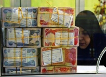  ایران طلب های خود از عراق با ۴۰ درصد ضرر در  بازار سیاه به دلار تبدیل کرد