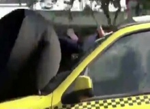 ماجرای زن آویزان از تاکسی در حال حرکت چه بود؟/ شهرداری اصفهان: اختلاف خانوادگی داشتند