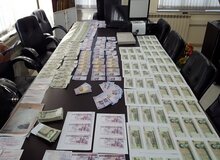 تصادف، توزیع کنندگان اسکناس تقلبی را به دام انداخت
