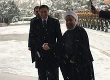 استقبال رسمی روحانی از همتای اروپایی اش در زیر بارش برف+ عکس