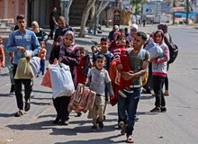 هجوم هزاران ساکن غزه به انبارهای مواد غذایی سازمان ملل